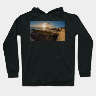 Fisheye view of wooden groynes on Cromer beach at sunrise Hoodie